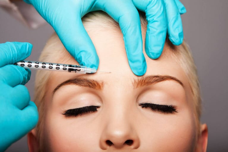 close up injection into forehead